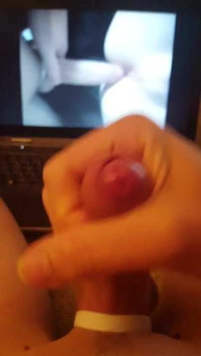 Cumming while watching a hot twink fuck video